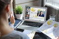 Business woman talking to her colleagues in video conference. Business team working from home using digital tablet Royalty Free Stock Photo