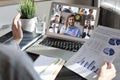 Business woman talking to her colleagues in video conference. Business team working from home using laptop Royalty Free Stock Photo
