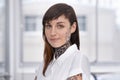 Business, woman and tattoo with portrait in office with confident attitude, serious and pride with mockup space Royalty Free Stock Photo