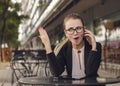 Business woman talking on the cellphone emotionally Royalty Free Stock Photo