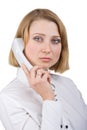 Business woman with a telephone receiver in hand Royalty Free Stock Photo