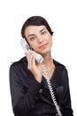 Business woman with a telephone receiver in hand Royalty Free Stock Photo