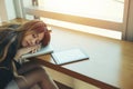 Business woman tired a sleep on the office room while working Royalty Free Stock Photo