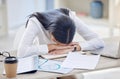 Business woman, tired and sleeping at office desk with burnout risk, overworked and nap for low energy. workplace Royalty Free Stock Photo