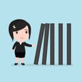 Business woman with toppling dominoes, Domino effect