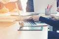 Business woman training on the computer, sitting at the desk with instruments, plan and laptop. Royalty Free Stock Photo