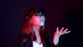 Business woman try vr glasses hololens in the dark room | Portrait of young asian girl experience ar communication | Future