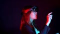 Business woman try vr glasses hololens in the dark room | Portrait of young asian girl experience ar communication | Future