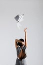Girl throwing papers Royalty Free Stock Photo