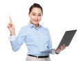 Business woman use laptop computer and finger point out Royalty Free Stock Photo