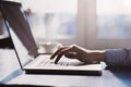 Business woman using laptop computer. Female hand typing on laptop keyboard Royalty Free Stock Photo