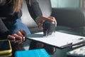 Business woman using stamp on document Royalty Free Stock Photo