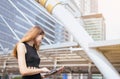 Businesswoman using a tablet computer and working outdoor Royalty Free Stock Photo