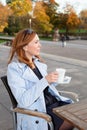 Business woman using tablet on lunch break. Royalty Free Stock Photo