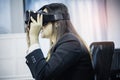 Business Woman using a VR headset for work with virtual reality, with fun and happy new experience, Concept of modern technologies Royalty Free Stock Photo