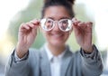 Business woman, vision and glasses in hands, face reflection and focus with designer frame and prescription lens Royalty Free Stock Photo