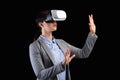 Business Woman In VR Headset Experiencing Virtual Reality, Studio Shot Royalty Free Stock Photo