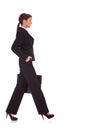 Business woman walking with a briefcase Royalty Free Stock Photo