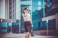 Business woman walking outside in city Royalty Free Stock Photo