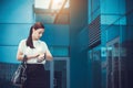 Business woman walking outside in city Royalty Free Stock Photo