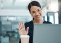 Business woman, waves on laptop video conference call during online staff meeting for office employees working from home