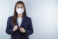 The business woman wearing protection face mask against coronavirus, PM 2.5 and cold. Coronavirus and Air pollution pm 2.5 concept