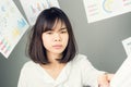 Business woman in a white dress is throw away a lot of paperwork and the documents are blown overhead. Royalty Free Stock Photo