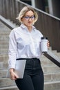 White collar woman with coffee