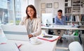 Business woman at work working and looking at computer screen in the office Royalty Free Stock Photo