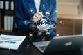 Business woman working on desk office with using a calculator to calculate the numbers, finance concept in office Royalty Free Stock Photo