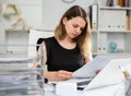 Business woman working with documents and laptop in office Royalty Free Stock Photo