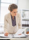Business woman working with documents in office Royalty Free Stock Photo