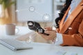 Business woman working on laptop and accounting financial report, accountant using calculator to calculate tax refund at office Royalty Free Stock Photo