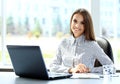 Business woman working on laptop computer