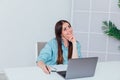 Business woman working on laptop at desk from office online finance