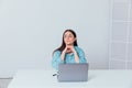 Business woman working on laptop at desk from office online finance