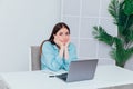 Business woman working on laptop at desk from office online finance