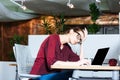 Business woman working with laptop and having headache in office Royalty Free Stock Photo