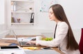 Business woman working on laptop at office Royalty Free Stock Photo