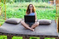 Business woman working on laptop outdoors. Royalty Free Stock Photo