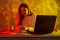 Business woman working on a laptop, stressful situation Royalty Free Stock Photo