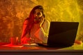 Business woman working on a laptop, stressful situation Royalty Free Stock Photo