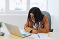 Business woman working in office at desk with laptop, anger and argument, discussing business processes online via video Royalty Free Stock Photo