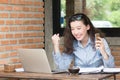 young business woman cheerful smile sitting at terrace cafe, enjoying online communication using free wireless internet connection Royalty Free Stock Photo