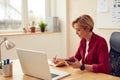 Business Woman Working At Office. Focused Lady Using Laptop Writing Notes Royalty Free Stock Photo