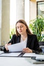 Business woman working with documents at cafe Royalty Free Stock Photo