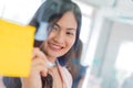 Business woman working and writing on the glass board in office. Lifestyle female work concept. depressed businesswoman Royalty Free Stock Photo