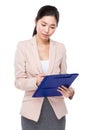 Business woman write on clipboard Royalty Free Stock Photo