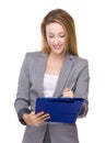 Business woman write on clipboard Royalty Free Stock Photo