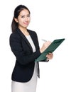 Business woman write down on clipboard